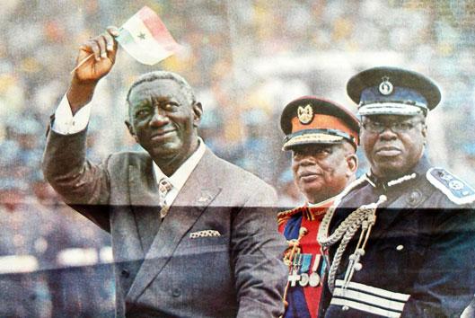 President Kufuor, wearing a suit during the Golden Jubilee Parade (front page Daily Graphic, March 7, 2007)