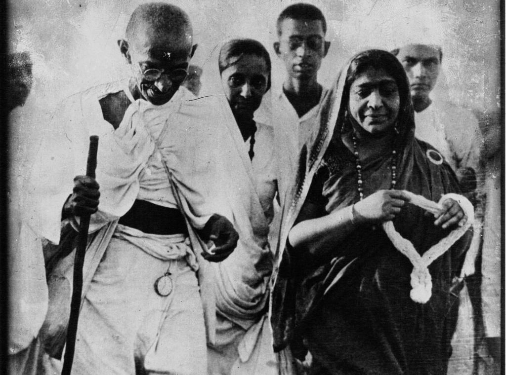 Gandhi and Mrs Sarojini Naidu. Picture taken during the Salt March.