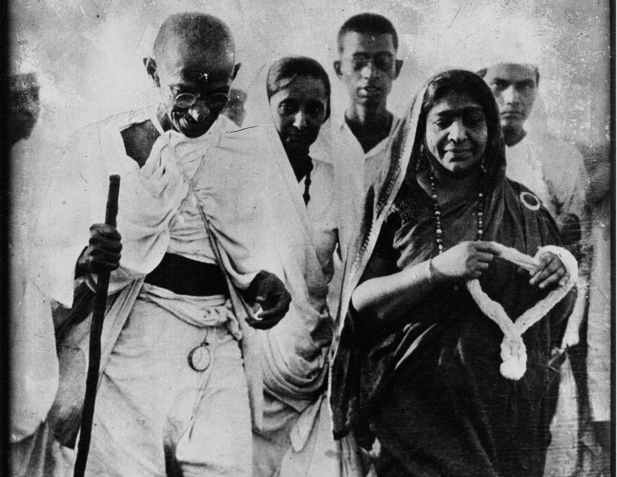 Gandhi and Mrs Sarojini Naidu. Picture taken during the Salt March.